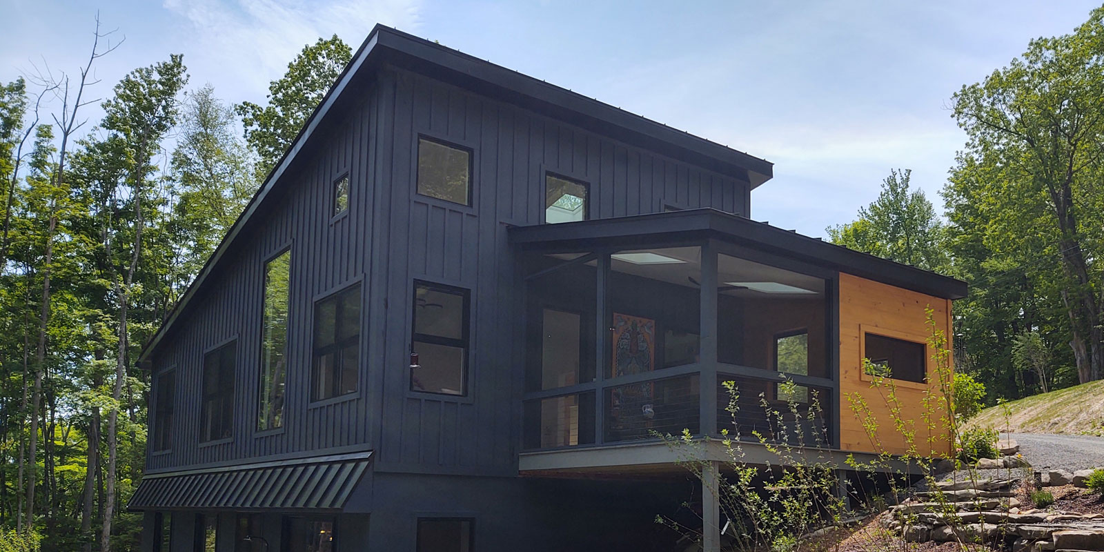 Modern house made with wood and shipping container materials