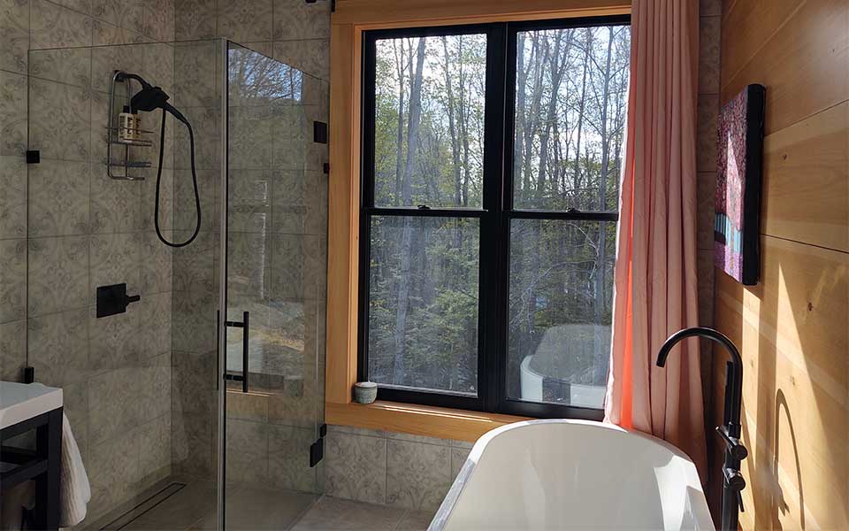 bathtub and shower by window 2