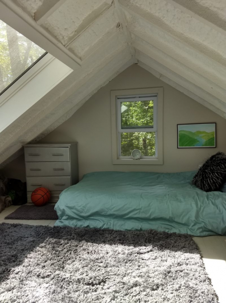 bedroom with large window for natural light
